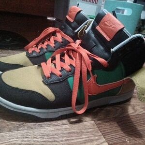 Nike Black and Green Sneakers with Orange Accents